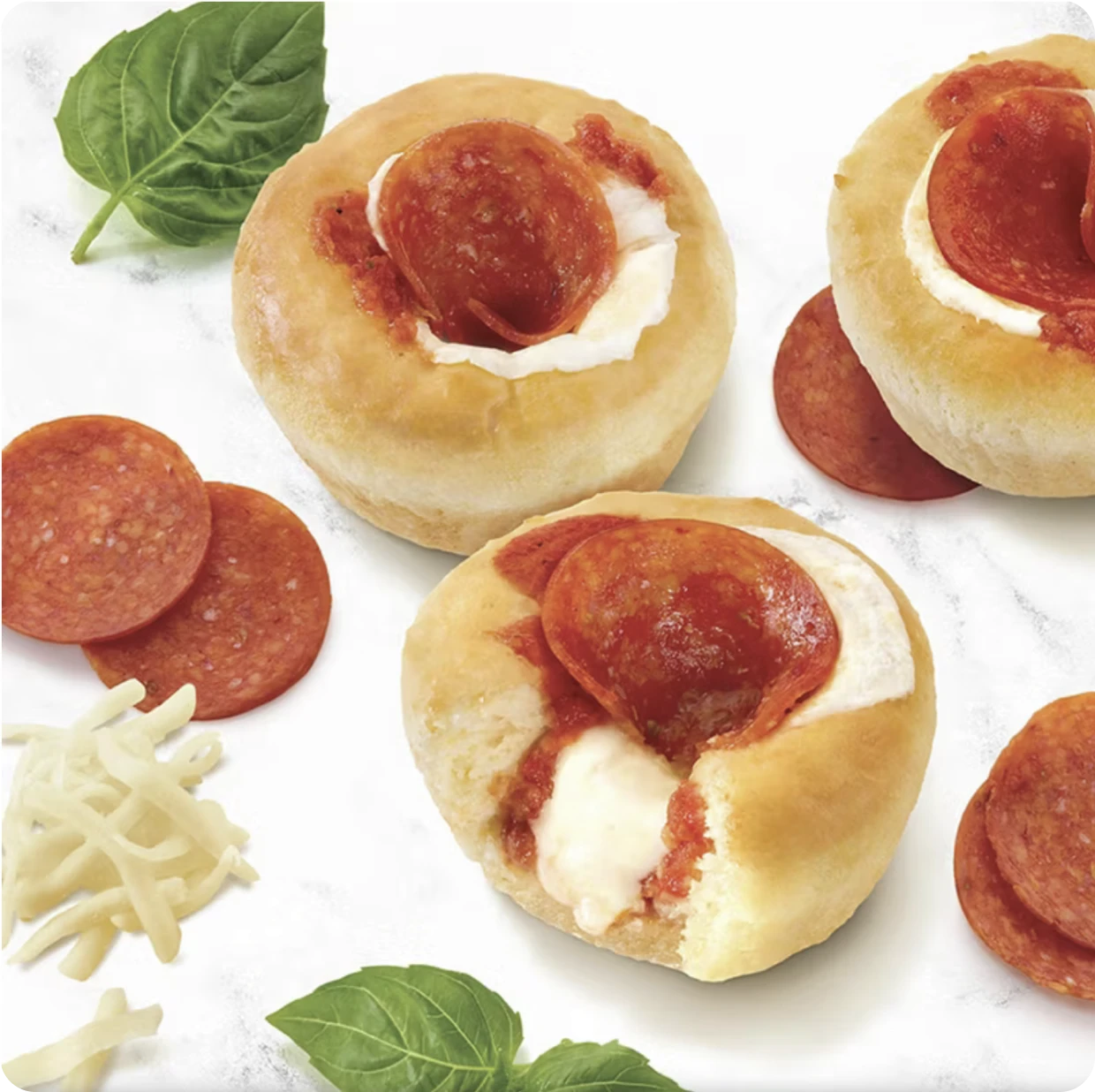 Savory pizza appetizers on white background